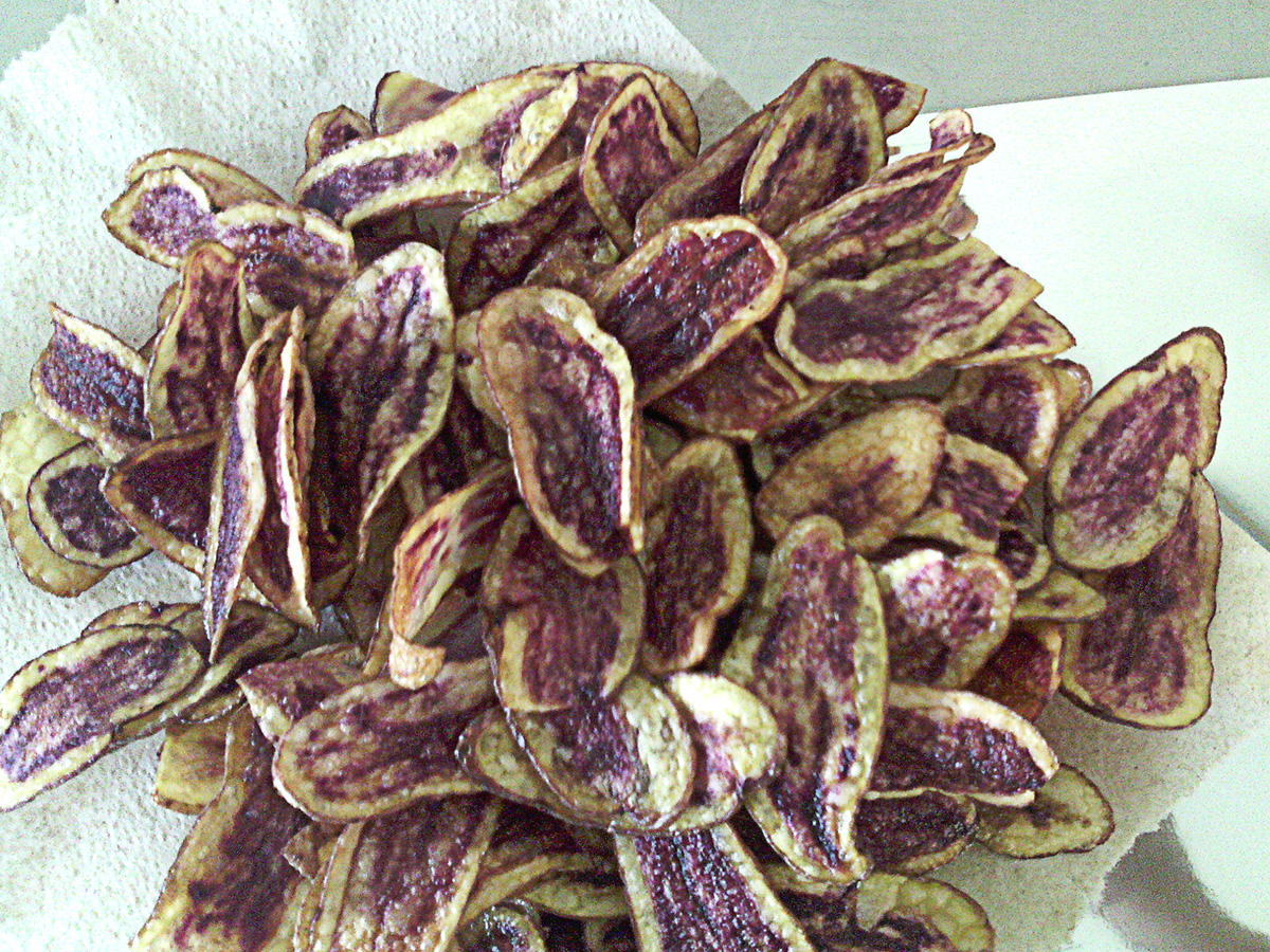 Potatoes are soft-textured and purple-red colored.